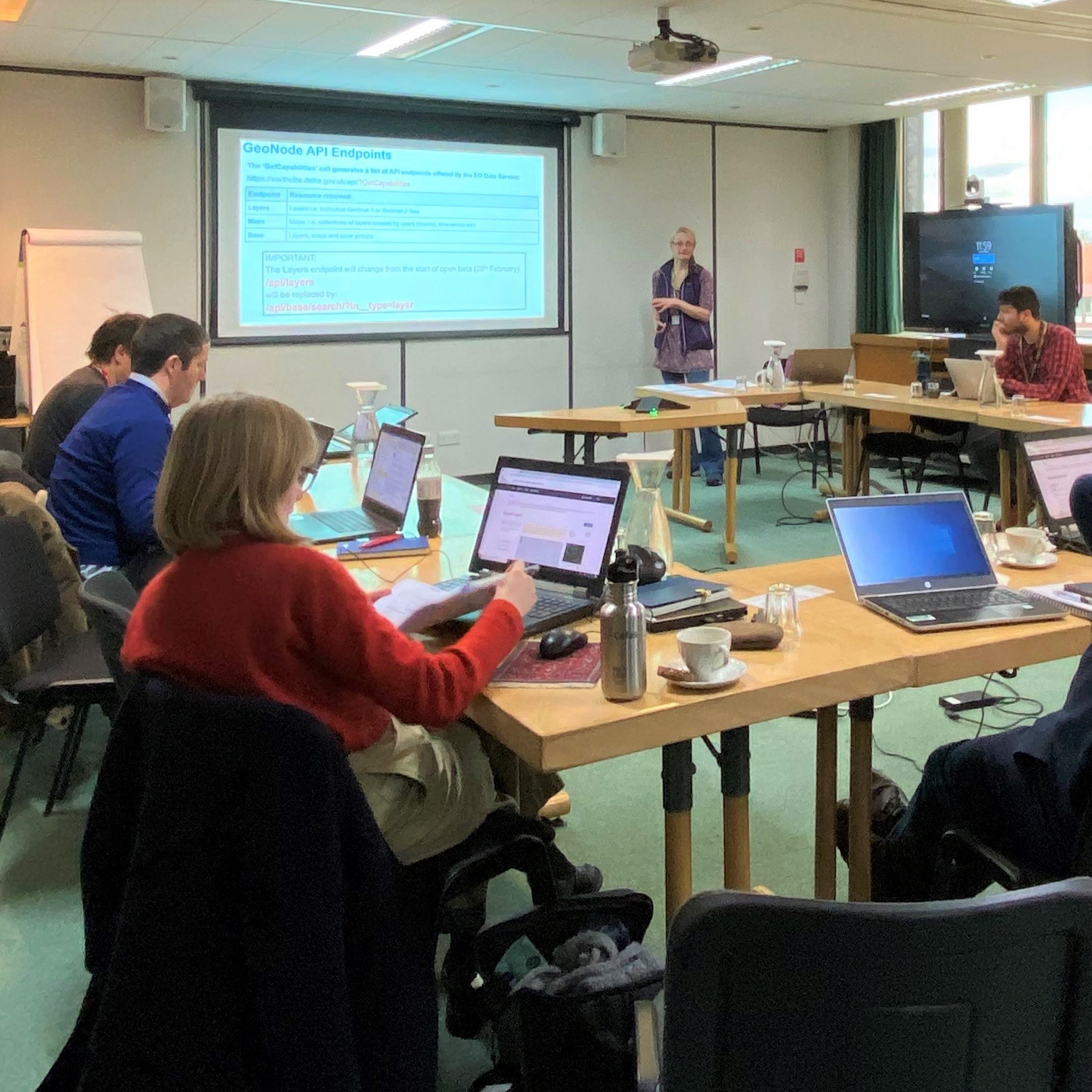 Photograph of people in a workshop