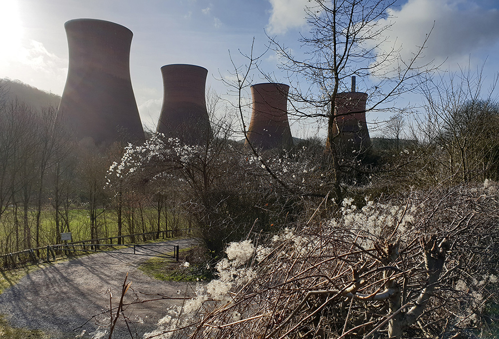 Photograph of some factory chimneys. Image courtesy of Alexandra Cunha.