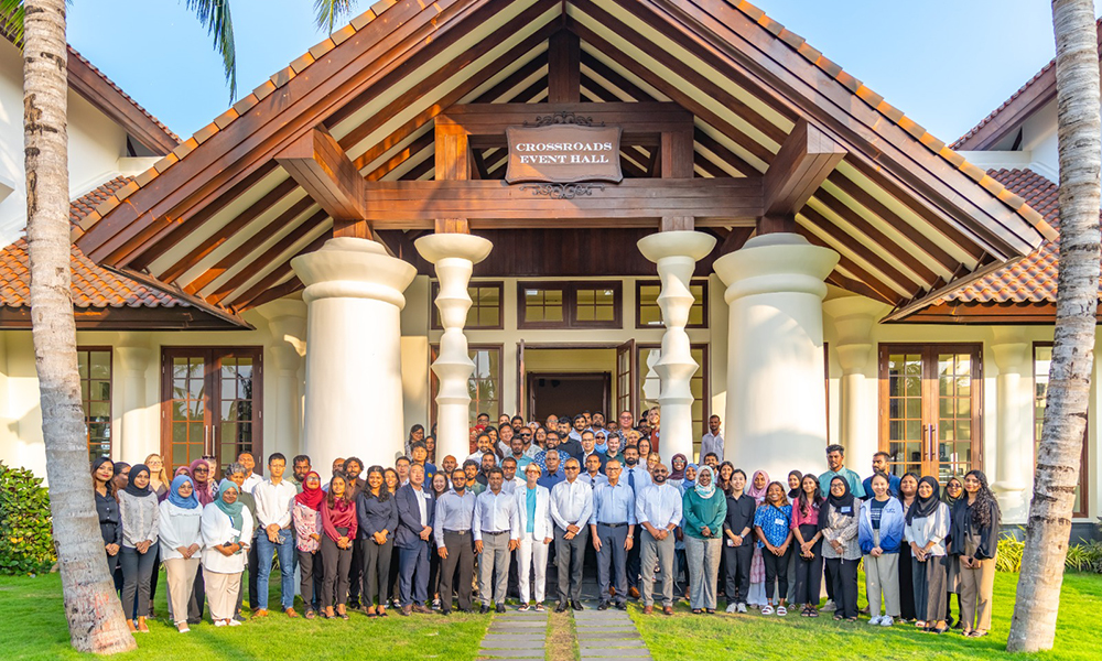 Photograph showing the participants at the forum standing outside the event location (image copyright O C P P)