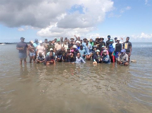 Image of Mozambique training team in water